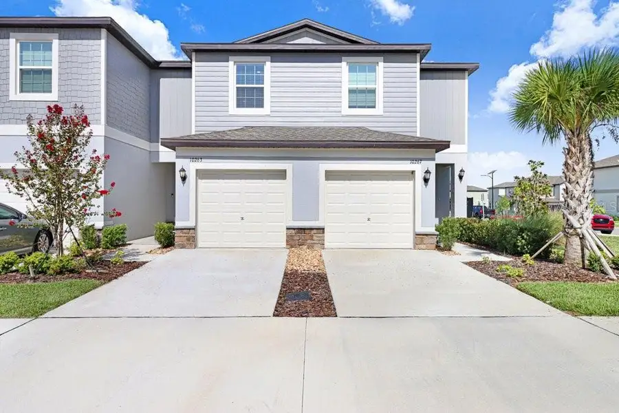 Front exterior of a new home in , San Antonio, FL, highlighting curb appeal (Image 23).