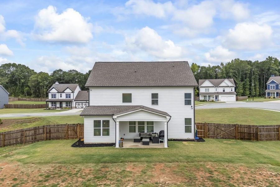 Front exterior of a new home in , Winder, GA, highlighting curb appeal (Image 1).