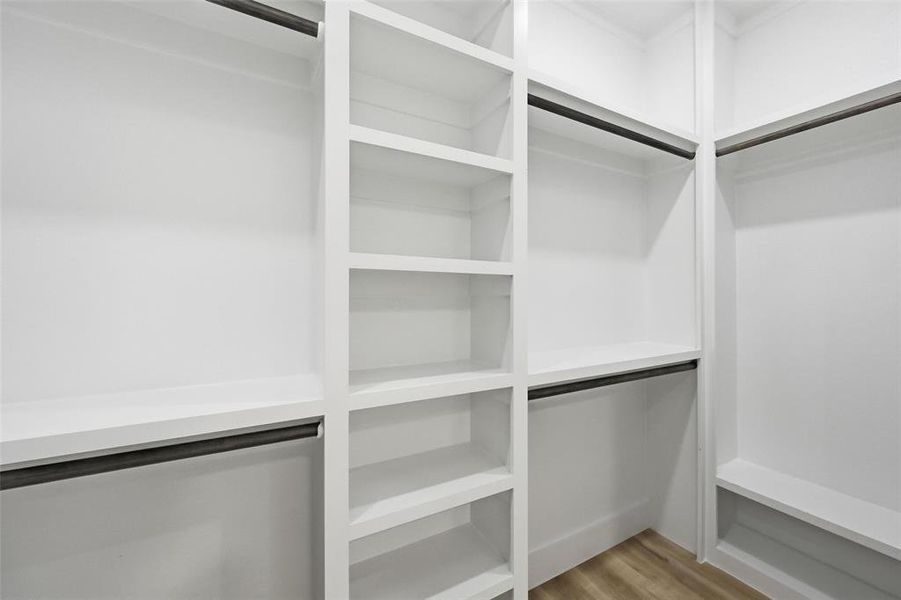 Spacious walk-in closet Spacious walk-in closet