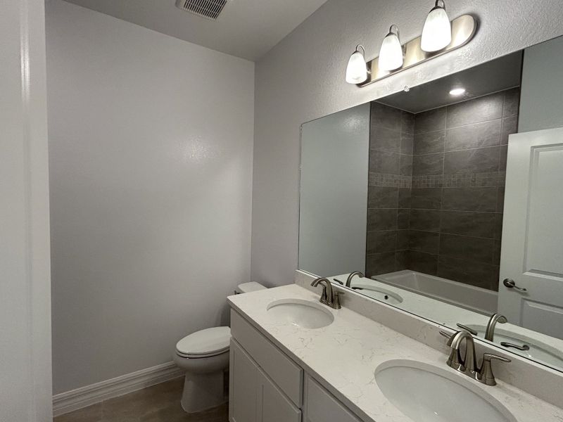 Furnished interior view inside a new home in Burnt Store, Cape Coral (Image 13). Furnished interior view inside a new home in Burnt Store, Cape Coral (Image 13).