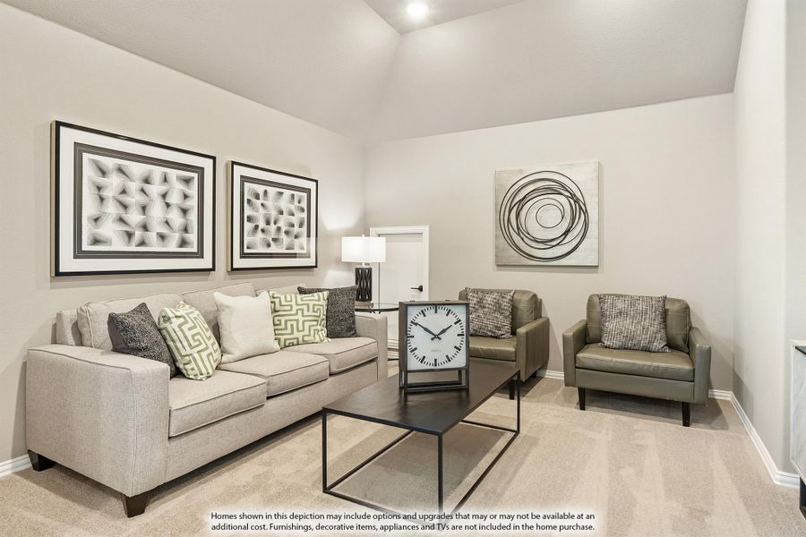 Living room with beige sofa, two leather chairs, coffee table, and framed wall art under vaulted ceiling