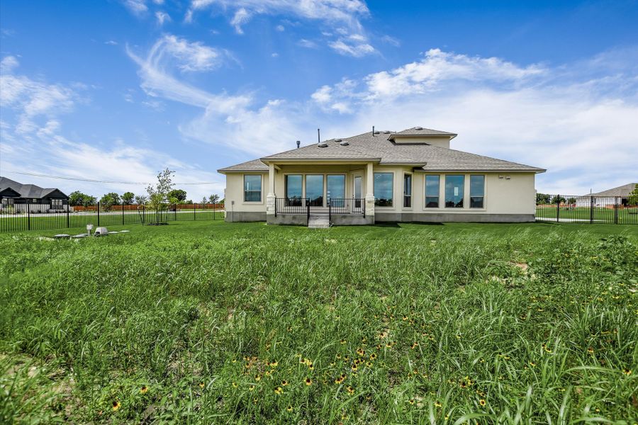 Exterior details and patio area of a home in Scofield Farms Estates, Georgetown (Image 25).