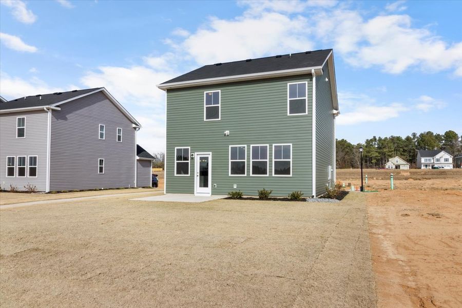 Exterior details and patio area of a home in Windsor, North Augusta (Image 17).