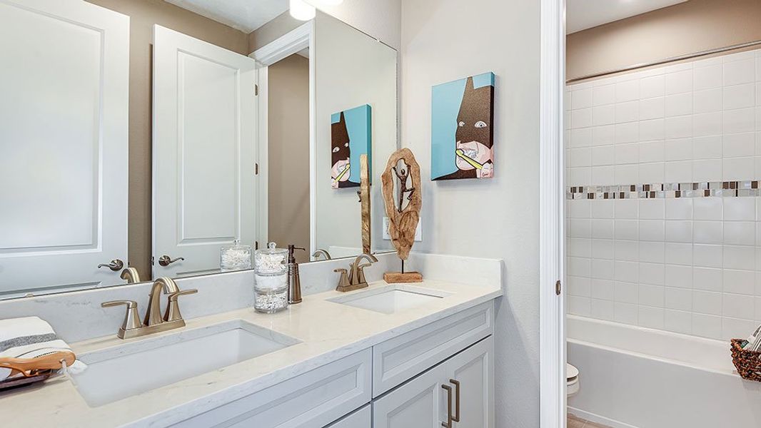 Representative furnished interior of a home built from the Barbuda by Taylor Morrison in Headwaters at Lofton Creek, Yulee (Image 13).