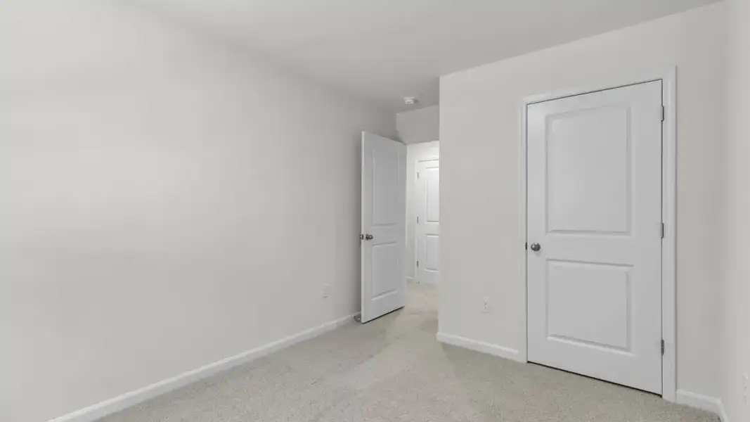 Spacious, unfurnished interior of a new home in The Townes at Prestleigh, Wake Forest (Image 21).