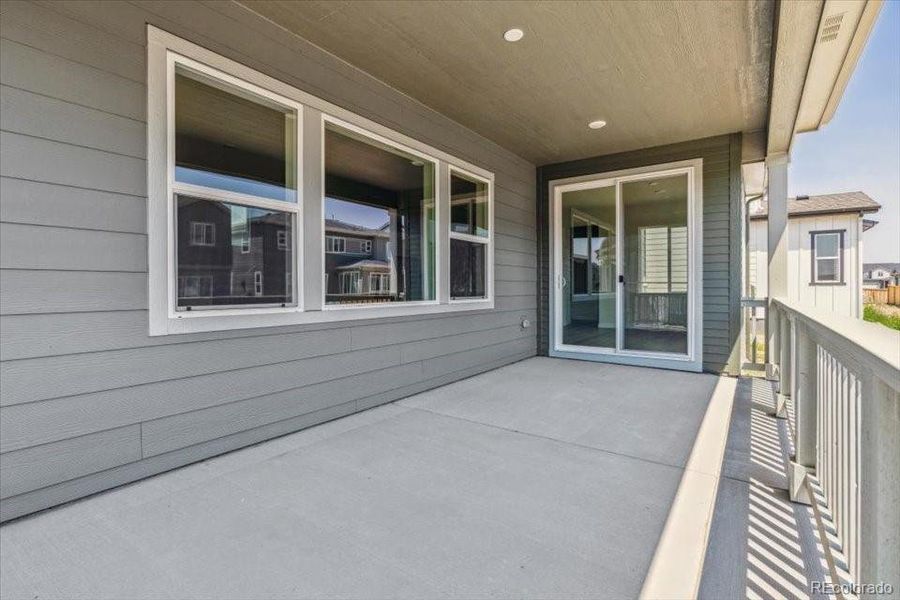 Exterior details and patio area of a home in Prestige Collection at Parkdale Commons, Lafayette (Image 2).