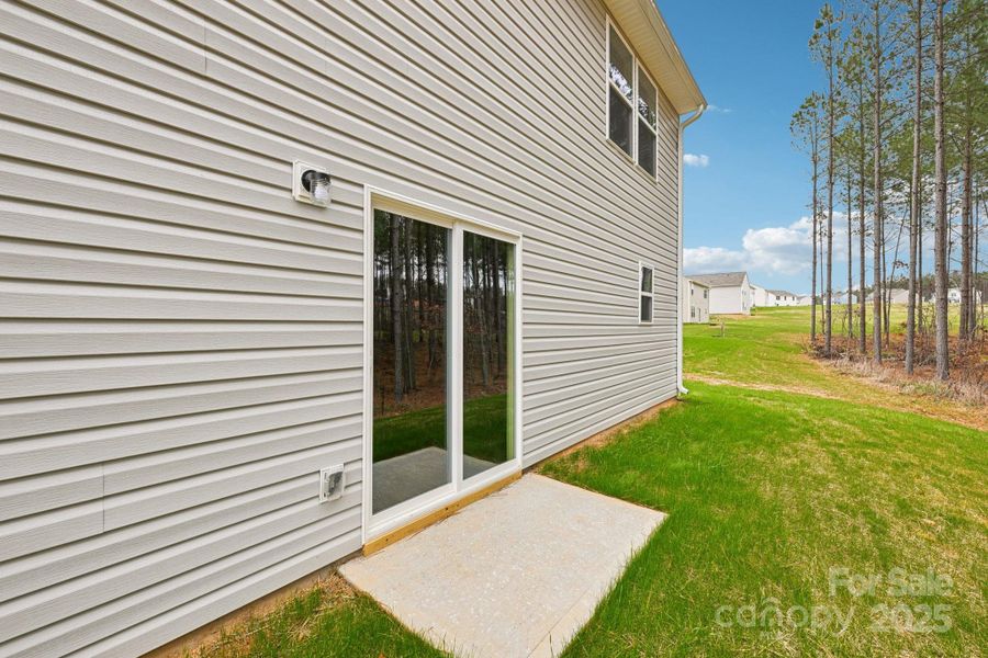 Exterior details and patio area of a home in The Pines at Stoney Point, Lexington (Image 3).