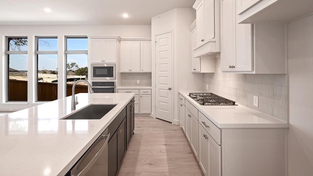 Furnished interior view inside a new home in 6 Creeks 45', Kyle (Image 8). Furnished interior view inside a new home in 6 Creeks 45', Kyle (Image 8).