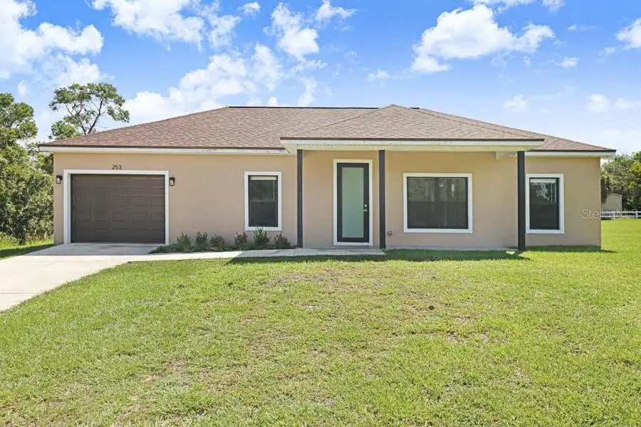 Front exterior of a new home in , Lake Placid, FL, highlighting curb appeal (Image 2). Front exterior of a new home in , Lake Placid, FL, highlighting curb appeal (Image 2).