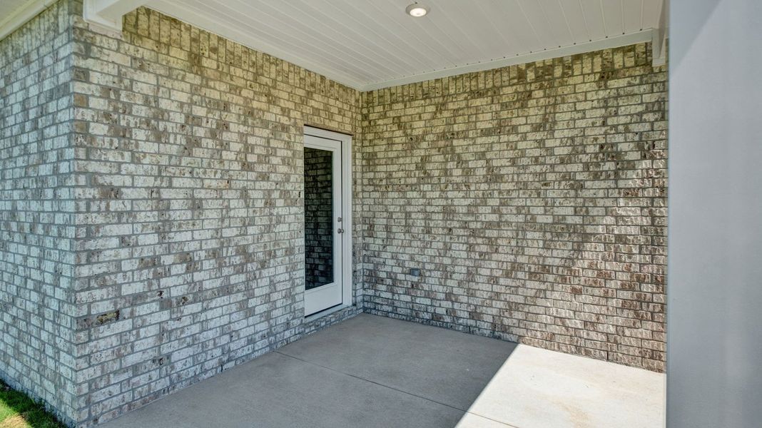 Exterior details and patio area of a home in Village Park, Oakland (Image 2). Exterior details and patio area of a home in Village Park, Oakland (Image 2).