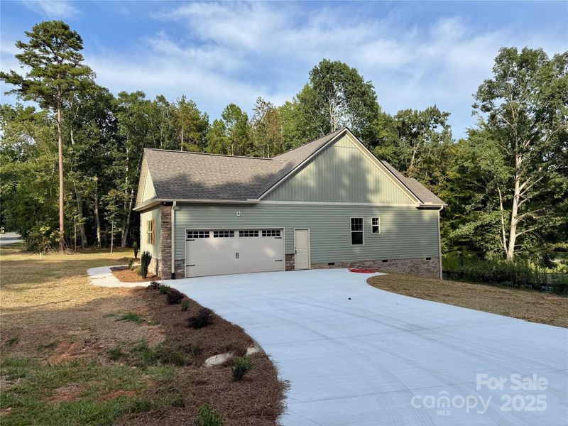 Front exterior of a new home in , Denton, NC, highlighting curb appeal (Image 1). Front exterior of a new home in , Denton, NC, highlighting curb appeal (Image 1).