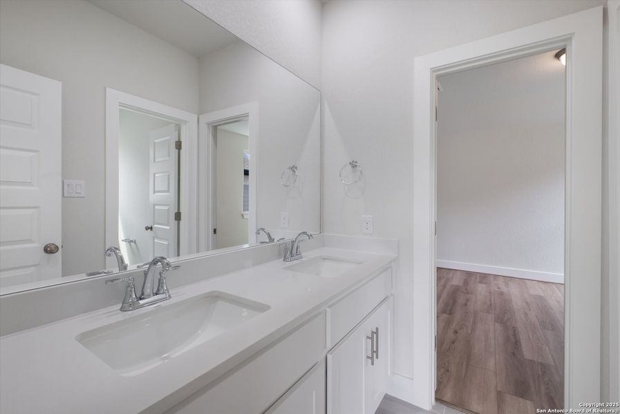 Furnished interior view inside a new home in Crown Ridge Manor, San Antonio (Image 11).