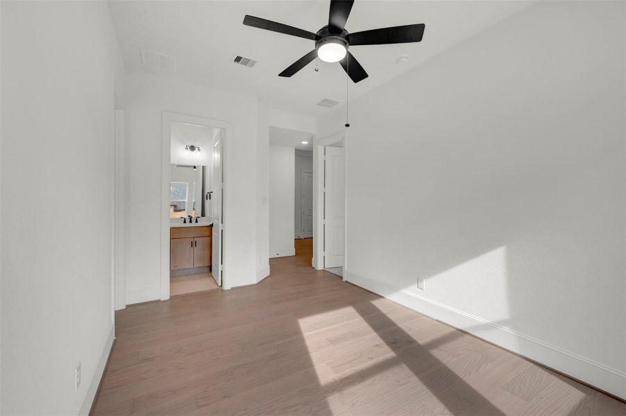 Spacious, unfurnished interior of a new home in The Woodlands Hills - Premier Collection, Willis (Image 18).