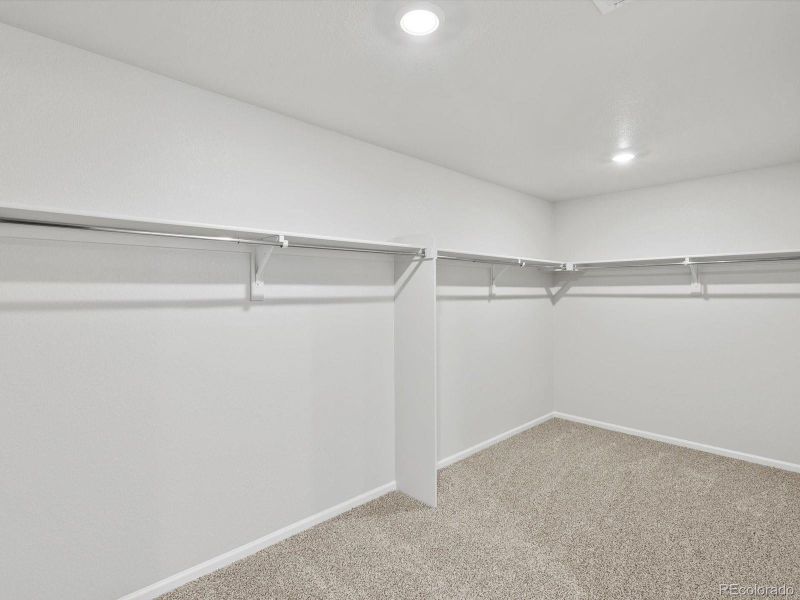 Spacious, unfurnished interior of a new home in Buffalo Highlands: The Flora Collection, Commerce City (Image 18).