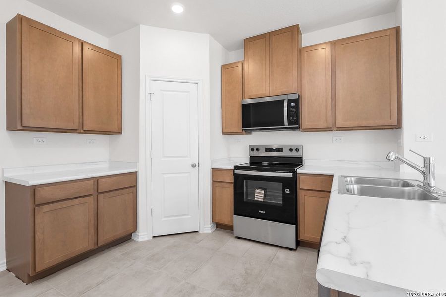 Furnished interior view inside a new home in Medina Crossing, Von Ormy (Image 5). Furnished interior view inside a new home in Medina Crossing, Von Ormy (Image 5).