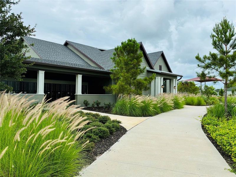 Front exterior of a new home in Two Rivers, Zephyrhills, FL, highlighting curb appeal (Image 24).