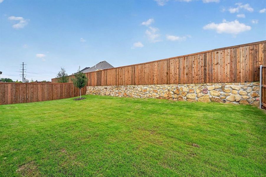 Exterior details and patio area of a home in Wellington, Haslet (Image 3).