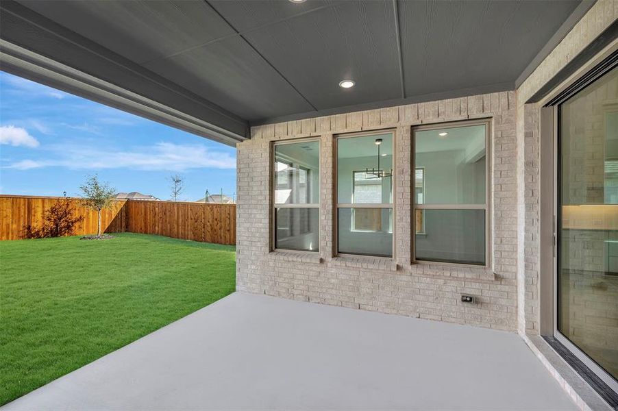 Exterior details and patio area of a home in Wellington, Haslet (Image 23).