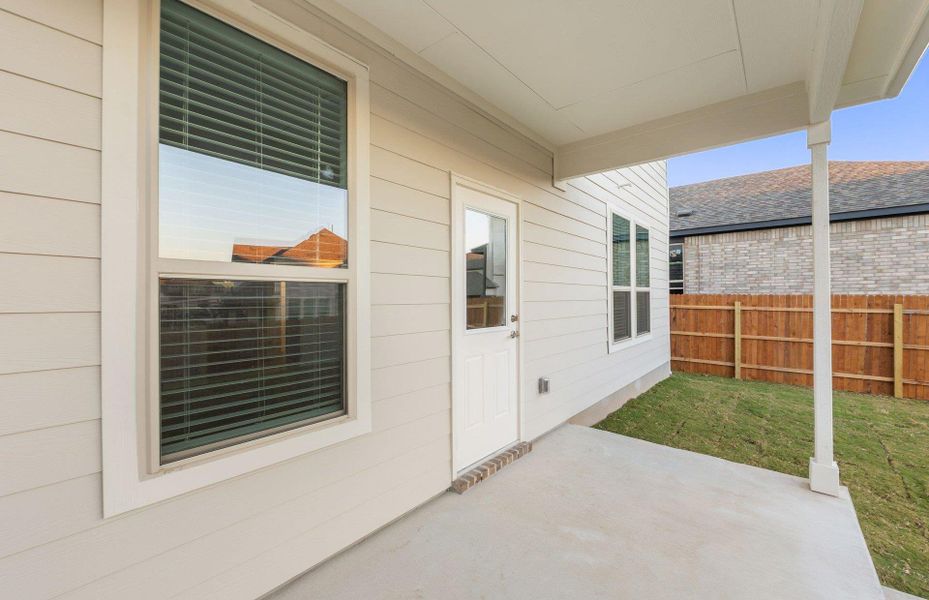 Exterior details and patio area of a home in Saddleback at Santa Rita Ranch, Liberty Hill (Image 18). Exterior details and patio area of a home in Saddleback at Santa Rita Ranch, Liberty Hill (Image 18).