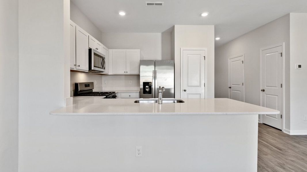 Furnished interior view inside a new home in The Townes at Wilson's Ridge, Smithfield (Image 6).