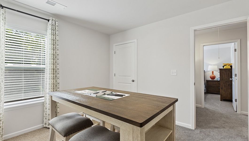 Representative furnished interior of a home built from the Robie by D.R. Horton in Brookside Farms - The Meadows, Greer (Image 34).