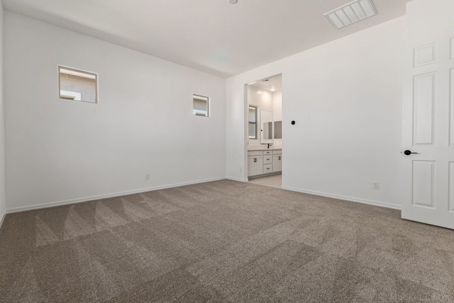 Spacious, unfurnished interior of a new home in Empire Pointe, Queen Creek (Image 9).