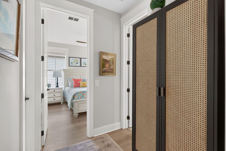 Furnished interior view inside a new home in K. Hovnanian's® Four Seasons at Lakes of Cane Bay, Summerville (Image 18).