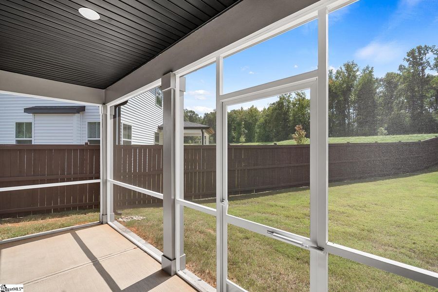 Exterior details and patio area of a home in Saratoga Oaks, Williamston (Image 26).