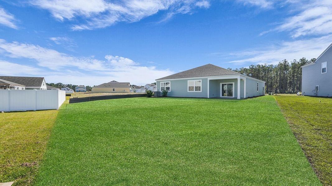 Exterior details and patio area of a home in Hillcrest, Ravenel (Image 20). Exterior details and patio area of a home in Hillcrest, Ravenel (Image 20).