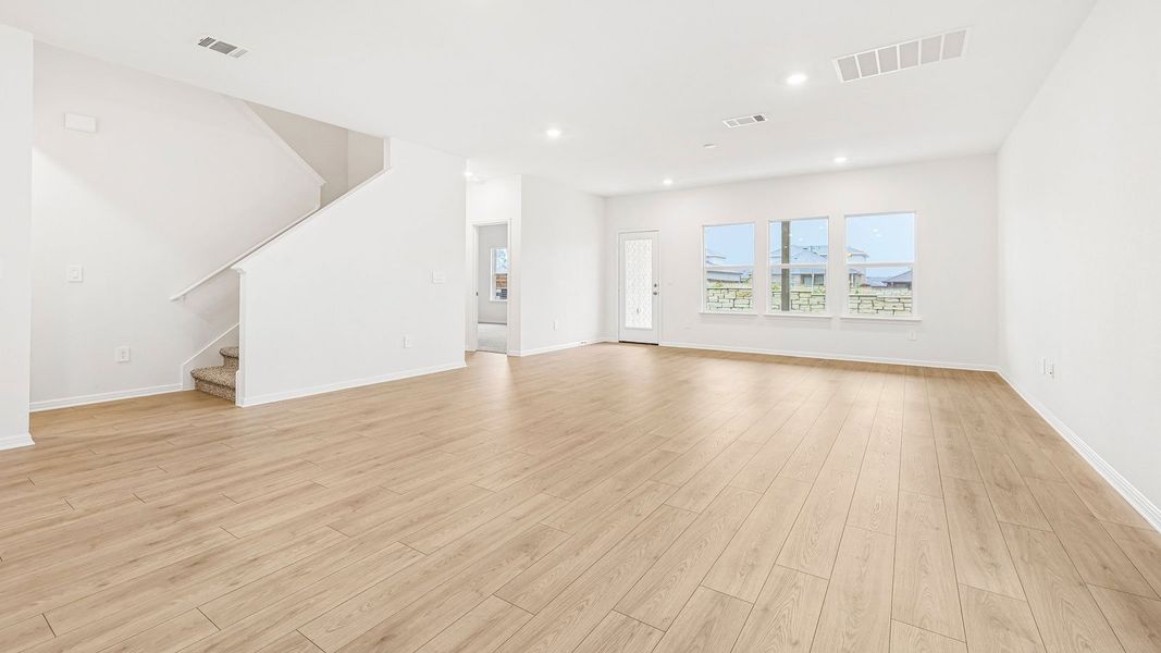 Spacious, unfurnished interior of a new home in Bar W Ranch, Leander (Image 18).