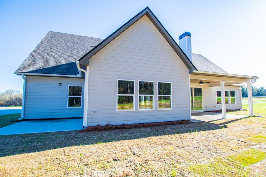 Exterior details and patio area of a home in The Reserve at Red Oaks, Carrollton (Image 21).