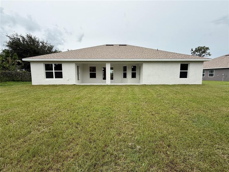 Front exterior of a new home in Rotonda, Rotonda West, FL, highlighting curb appeal (Image 1). Front exterior of a new home in Rotonda, Rotonda West, FL, highlighting curb appeal (Image 1).