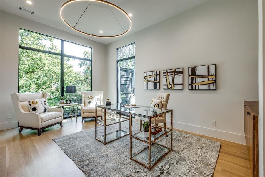 Office space featuring light hardwood / wood-style flooring