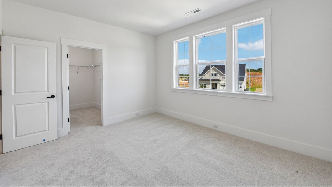 The Awaken Plan by DRB Elevate in Brook Run, Fort Mill SC - Bedroom 2 with walk-in closet
