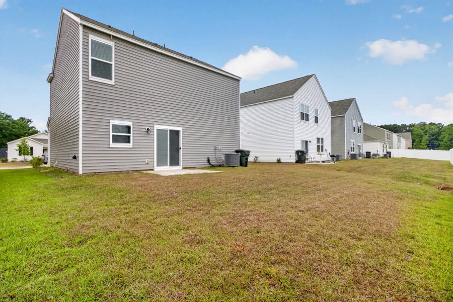 Exterior details and patio area of a home in Back River Bend, Goose Creek (Image 3).