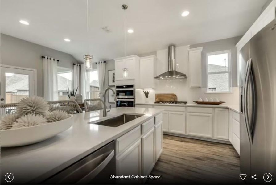 Interior photos- Photo of Pulte model home with same floor plan, not of actual home listed.