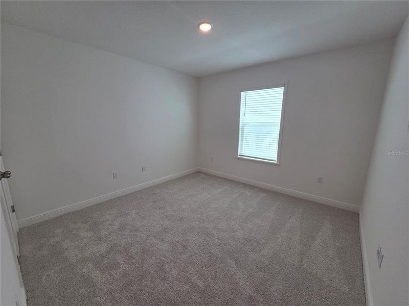 Spacious, unfurnished interior of a new home in Villamar, Winter Haven (Image 27).