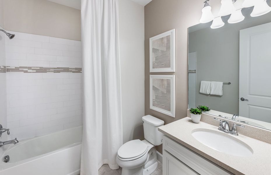 Furnished interior view inside a new home in BeachWalk by Manasota Key, Englewood (Image 6).