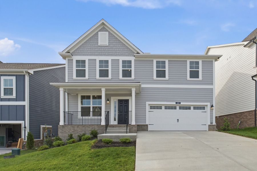 Front exterior of a new home in McCain's Station, Gallatin, TN, highlighting curb appeal (Image 2).