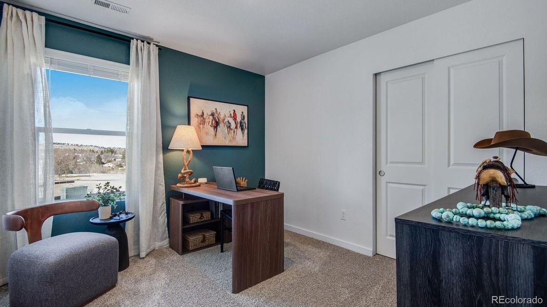 Furnished interior view inside a new home in The Ridge at Lorson Ranch, Colorado Springs (Image 8).