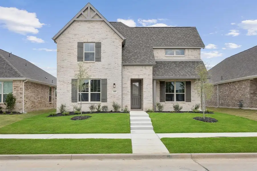 Front exterior of a new home in Dove Hollow, Waxahachie, TX, highlighting curb appeal (Image 1). Front exterior of a new home in Dove Hollow, Waxahachie, TX, highlighting curb appeal (Image 1).