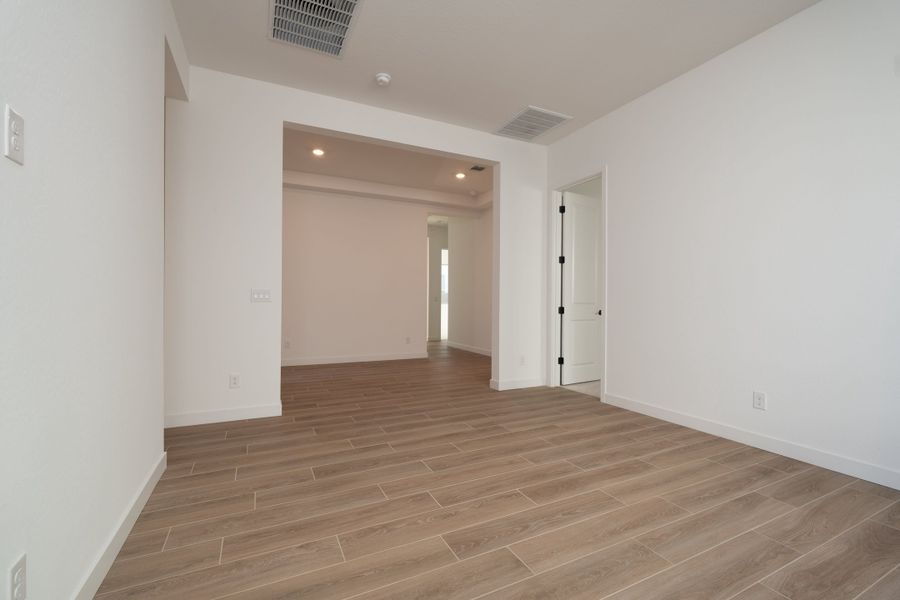 Spacious, unfurnished interior of a new home in Waterston Central, Gilbert (Image 11).