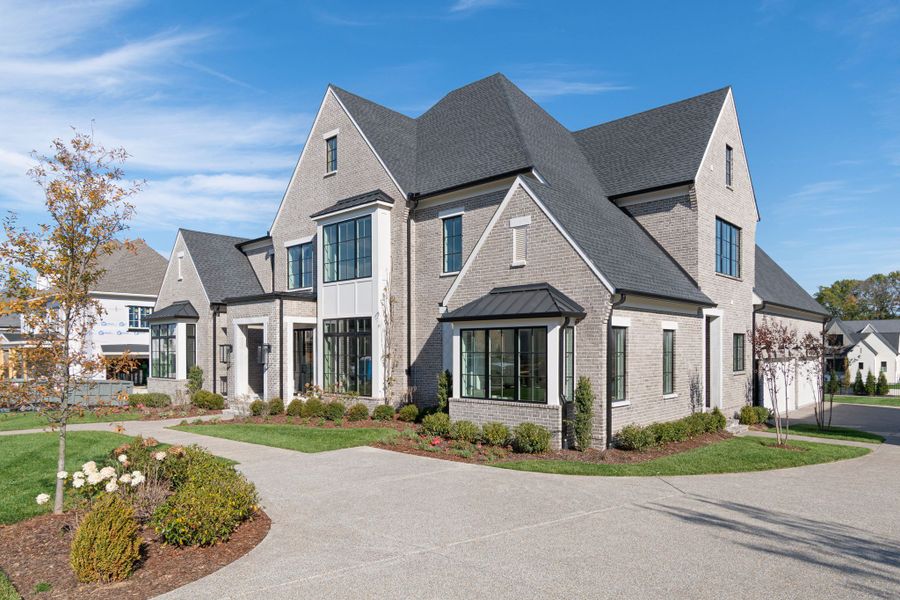 Front exterior of a new home in Rosebrooke, Brentwood, TN, highlighting curb appeal (Image 1).