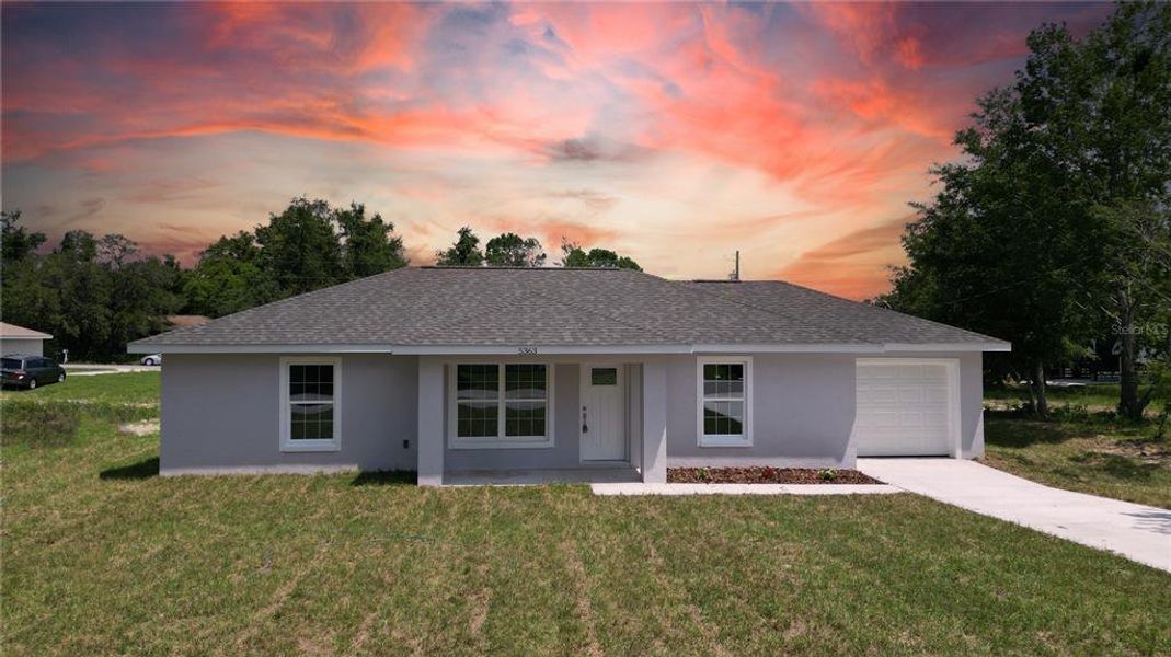 Front exterior of a new home in , Ocala, FL, highlighting curb appeal (Image 1). Front exterior of a new home in , Ocala, FL, highlighting curb appeal (Image 1).