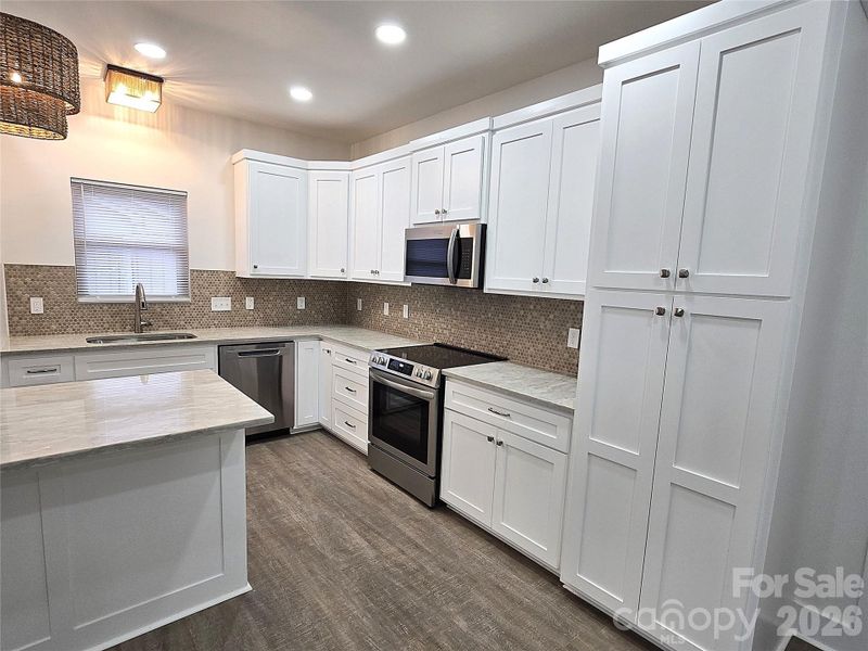 Furnished interior view inside a new home in , Hickory (Image 6).