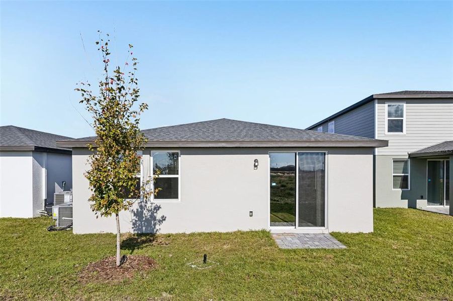 Exterior details and patio area of a home in Crosswinds - Classic Series, Haines City (Image 23).