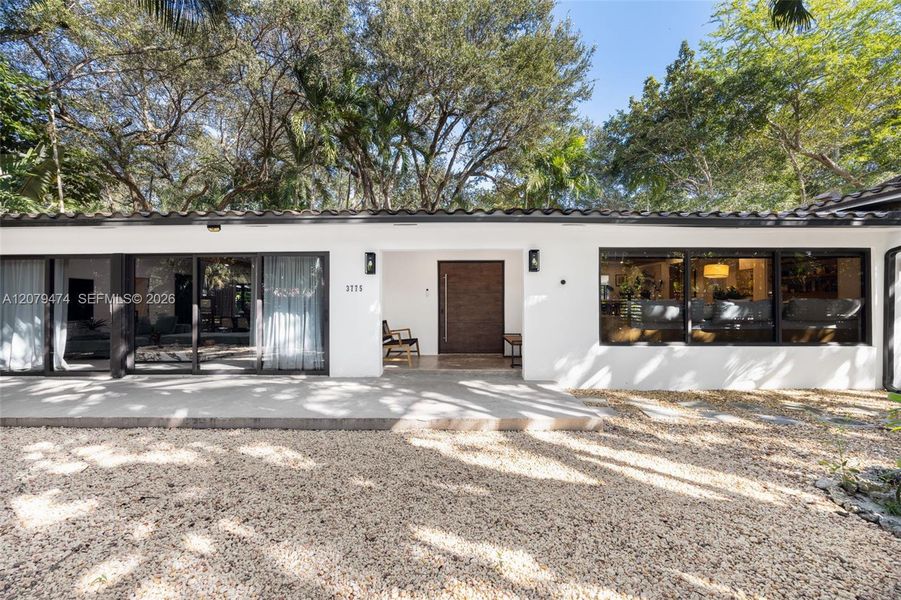 Exterior details and patio area of a home in , Miami (Image 2). Exterior details and patio area of a home in , Miami (Image 2).
