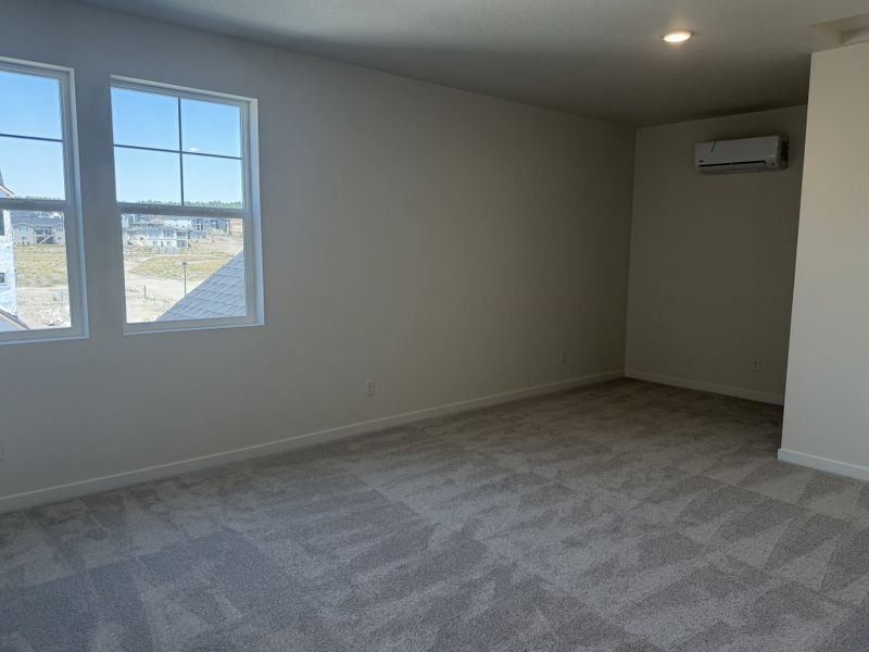 Spacious, unfurnished interior of a new home in Elevate at Wolf Ranch, Colorado Springs (Image 9).