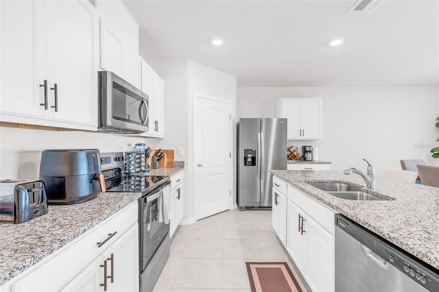 Furnished interior view inside a new home in Cypress Park Estates, Haines City (Image 12).