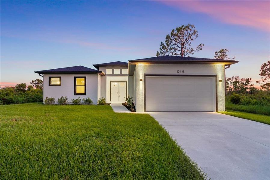 Front exterior of a new home in , Port Charlotte, FL, highlighting curb appeal (Image 29). Front exterior of a new home in , Port Charlotte, FL, highlighting curb appeal (Image 29).